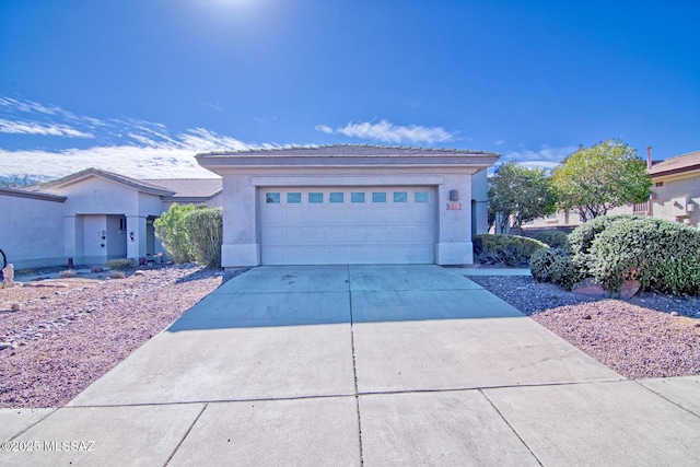 4621 S Pinnacle Peak Dr, Green Valley, AZ 85622 - single story home featuring driveway, stucco siding, a garage, and a tiled roof