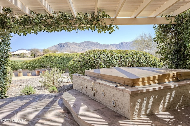 view of patio with a mountain view