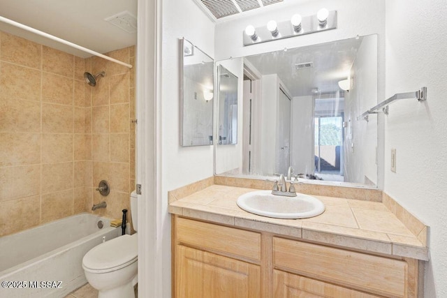 full bathroom featuring visible vents, vanity, toilet, and shower / bathtub combination