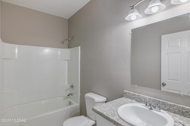 full bathroom featuring toilet,  shower combination, and vanity