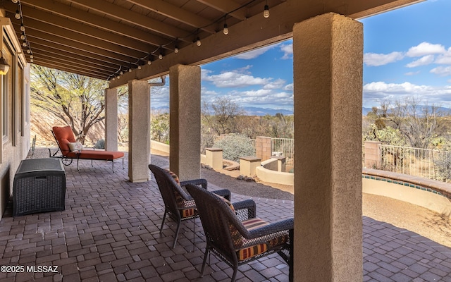 view of patio with fence