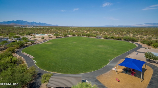 birds eye view of property featuring a mountain view