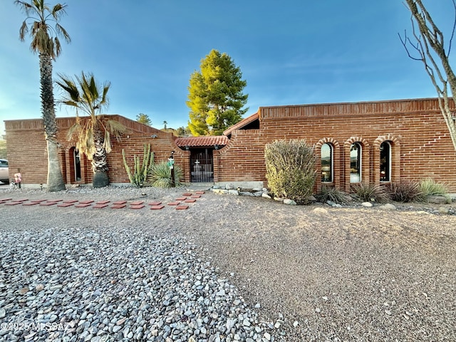 view of front of property with brick siding