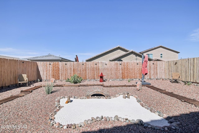 view of yard featuring a fenced backyard