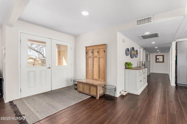 entryway featuring visible vents, dark wood-type flooring, and recessed lighting