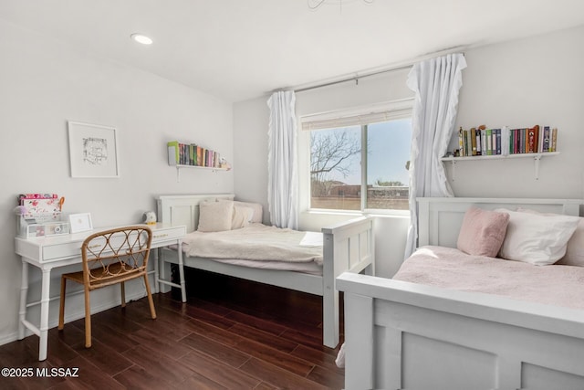 bedroom featuring dark wood finished floors and recessed lighting