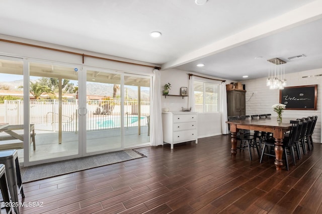 dining room featuring recessed lighting, visible vents, dark wood finished floors, and beamed ceiling