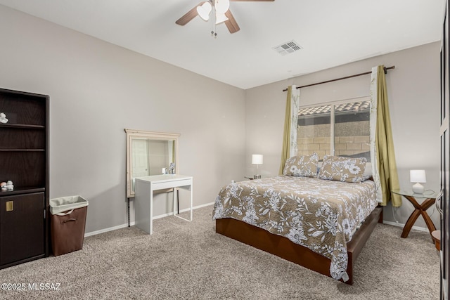 bedroom with carpet, baseboards, visible vents, and a ceiling fan