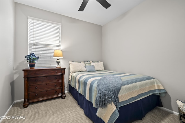 bedroom featuring lofted ceiling, carpet, baseboards, and a ceiling fan