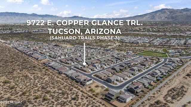 bird's eye view featuring a residential view and a mountain view