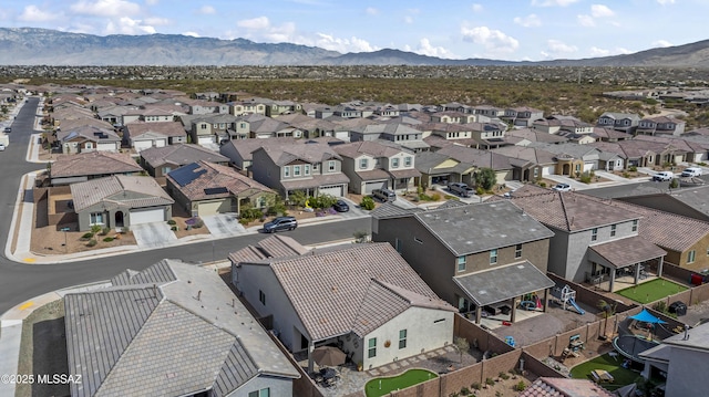 bird's eye view featuring a residential view and a mountain view