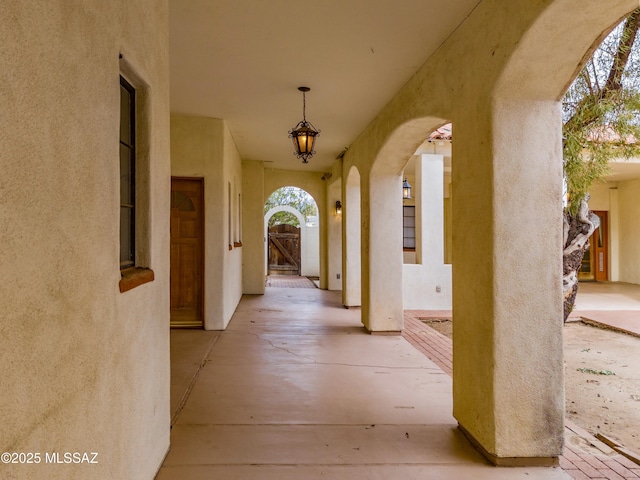 hall with arched walkways