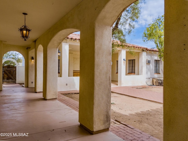 view of patio featuring a gate