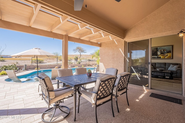 view of patio / terrace with a fenced in pool, fence, outdoor dining area, and a pergola