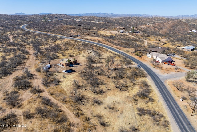 birds eye view of property featuring a rural view and a mountain view