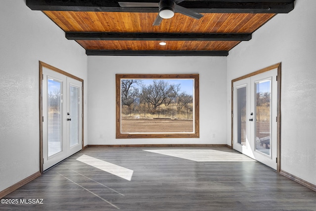 unfurnished room with wood ceiling, french doors, baseboards, and beam ceiling