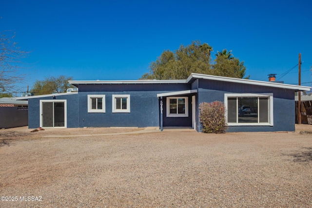 view of front of house featuring stucco siding