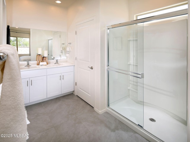 full bath featuring vanity, recessed lighting, a stall shower, and tile patterned flooring