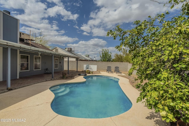 view of pool with central air condition unit, a fenced in pool, a fenced backyard, and a patio area