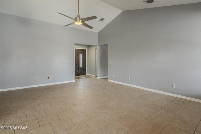 unfurnished room with baseboards, visible vents, and a ceiling fan