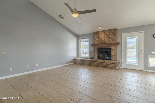 unfurnished living room featuring baseboards, a fireplace, high vaulted ceiling, and a ceiling fan