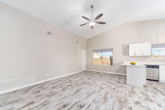 unfurnished living room featuring baseboards, visible vents, high vaulted ceiling, light wood finished floors, and ceiling fan