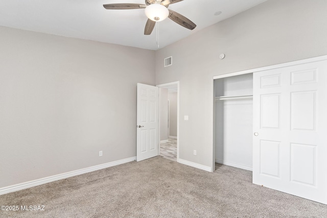 unfurnished bedroom with visible vents, a ceiling fan, a closet, carpet floors, and baseboards