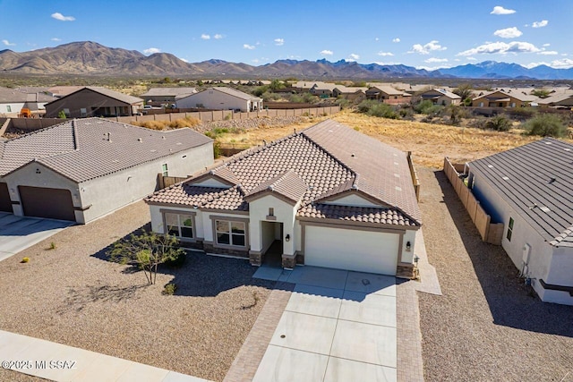 birds eye view of property featuring a residential view and a mountain view