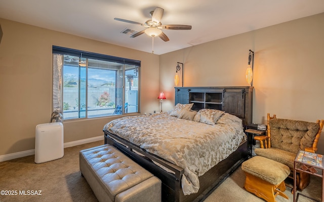 bedroom featuring carpet floors, visible vents, ceiling fan, and baseboards