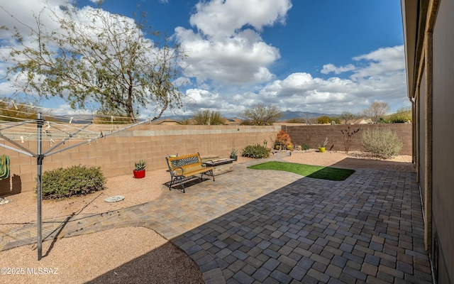 view of patio / terrace featuring a fenced backyard