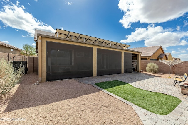 garage with a gate and fence