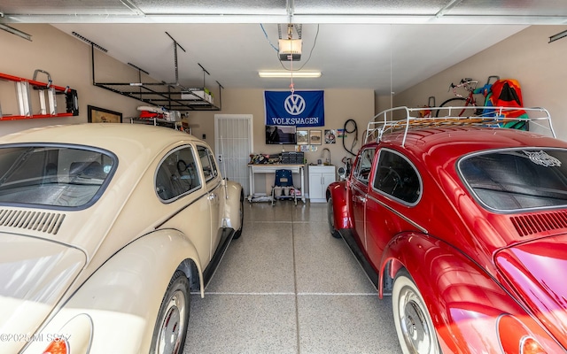 garage featuring a garage door opener