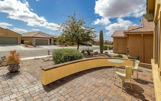 view of patio / terrace with a residential view