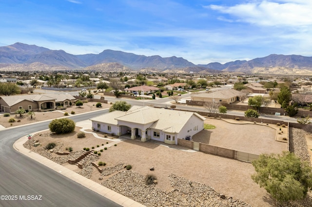 bird's eye view featuring a residential view and a mountain view