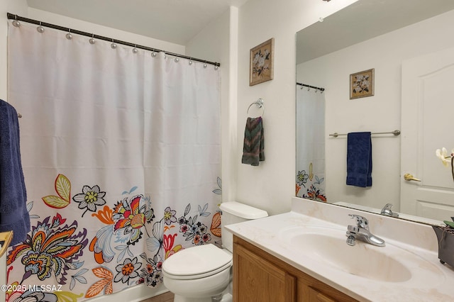 full bath with a shower with shower curtain, toilet, and vanity