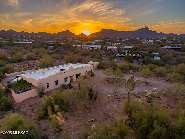 aerial view at dusk with a mountain view