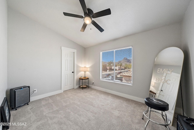 unfurnished room with lofted ceiling, baseboards, carpet floors, and ceiling fan