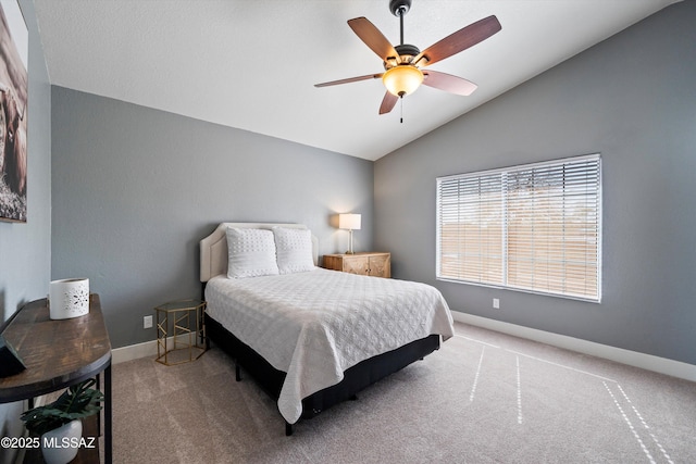 bedroom featuring vaulted ceiling, ceiling fan, baseboards, and carpet floors