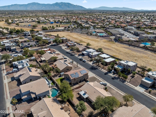 drone / aerial view featuring a mountain view and a residential view