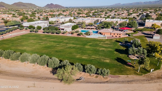 birds eye view of property with a mountain view and a residential view