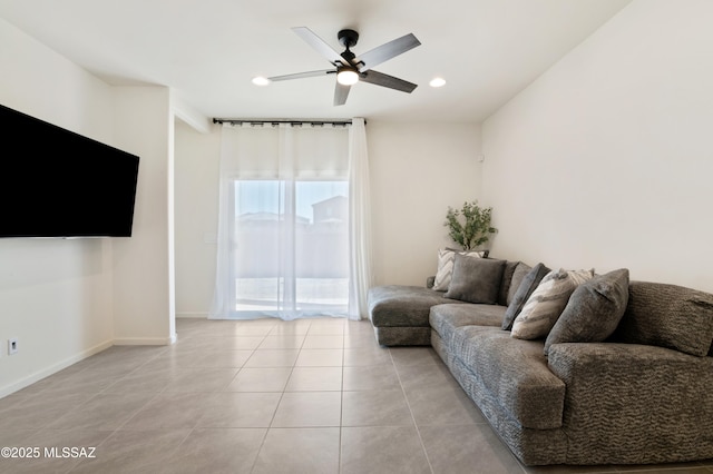 living area with recessed lighting, baseboards, a ceiling fan, and light tile patterned flooring