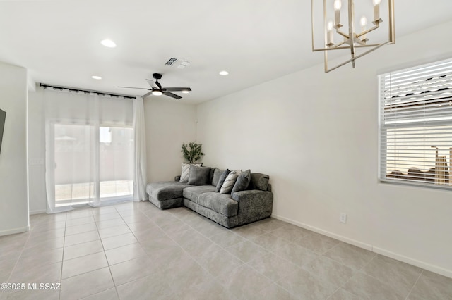 living area with recessed lighting, visible vents, light tile patterned flooring, ceiling fan, and baseboards