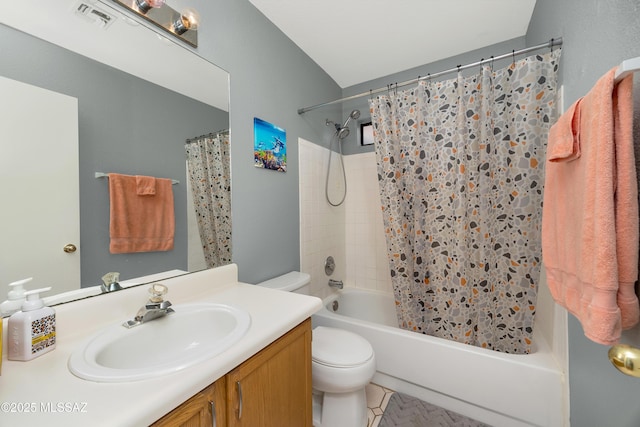 full bathroom with toilet, vanity, visible vents, and shower / tub combo with curtain