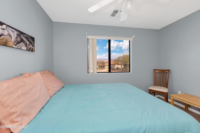 bedroom with visible vents and ceiling fan