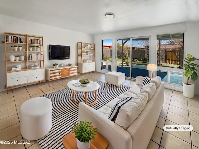 living area with light tile patterned floors