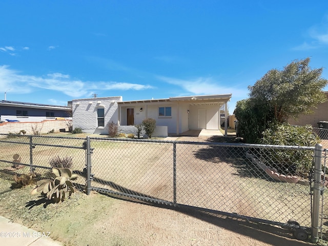 view of front of home with fence