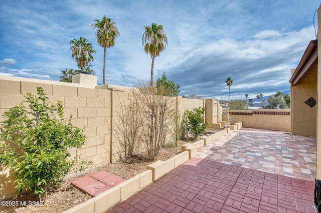 view of patio featuring a fenced backyard