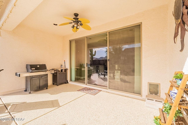 view of patio featuring a ceiling fan