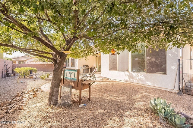 view of yard featuring a patio area and a fenced backyard