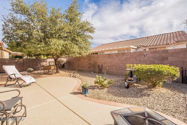 view of patio / terrace featuring a fenced backyard